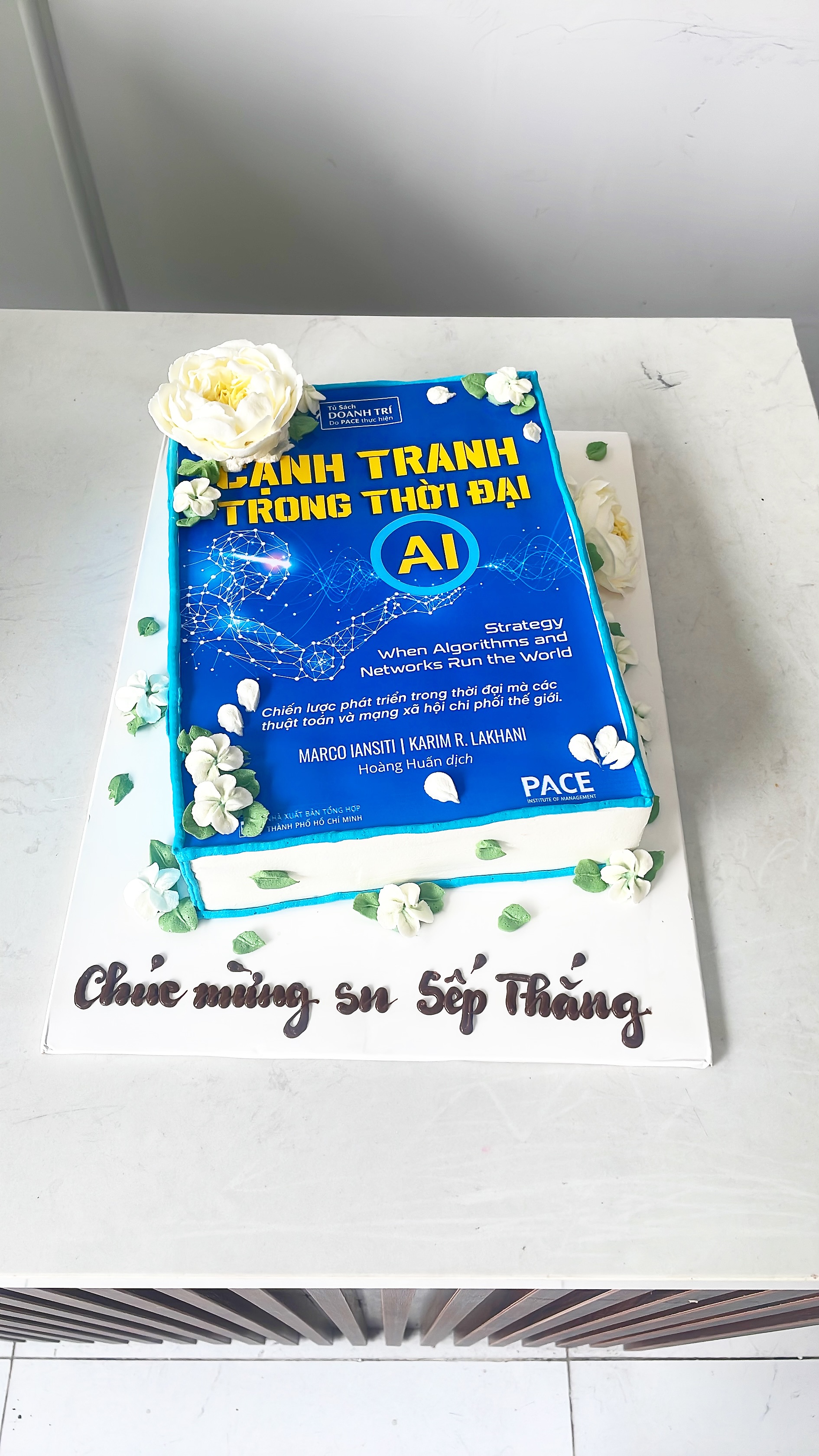 Bánh hình cuốn sách AI