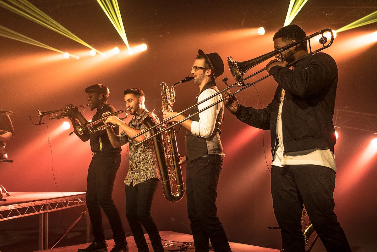 Jam Hot horn section jamming on stage