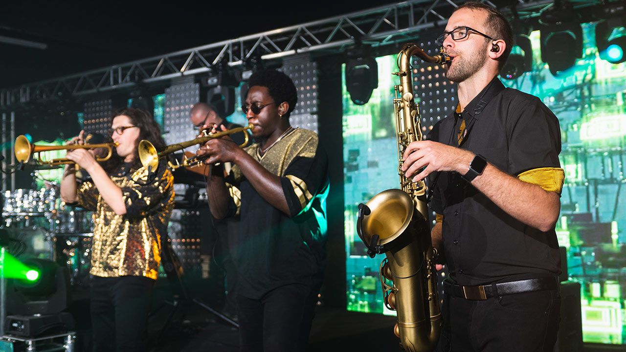 Big-Ass Brass Band perform on stage