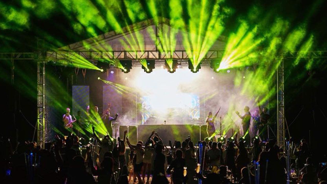 DJ and band perform live on stage