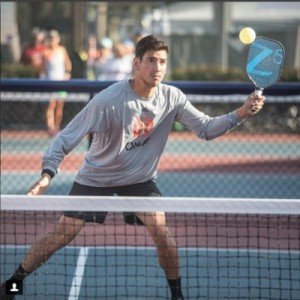 player with paddle in hand