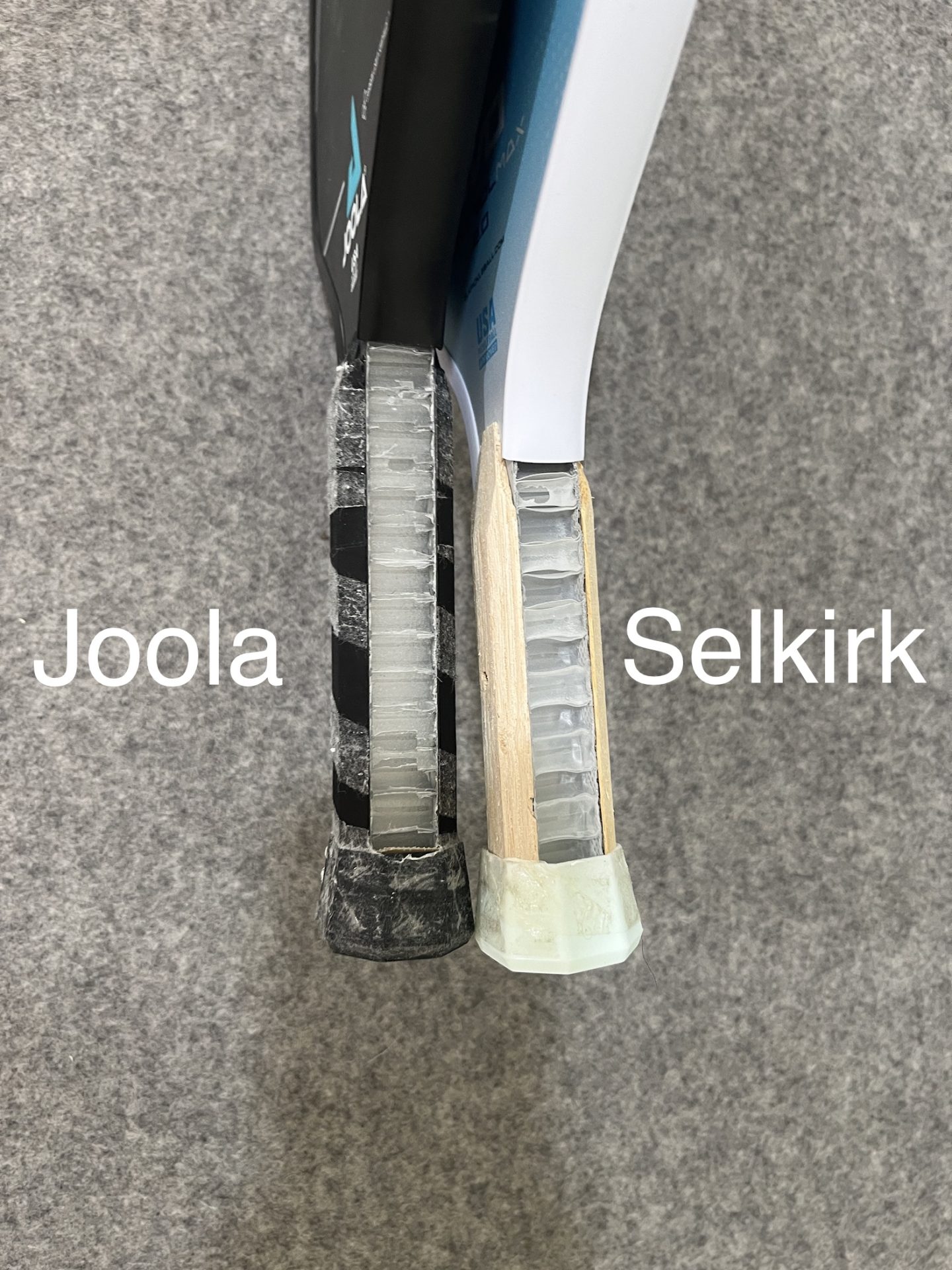 shows that the Selkirk evo has a cheaper handle design than the Joola vision