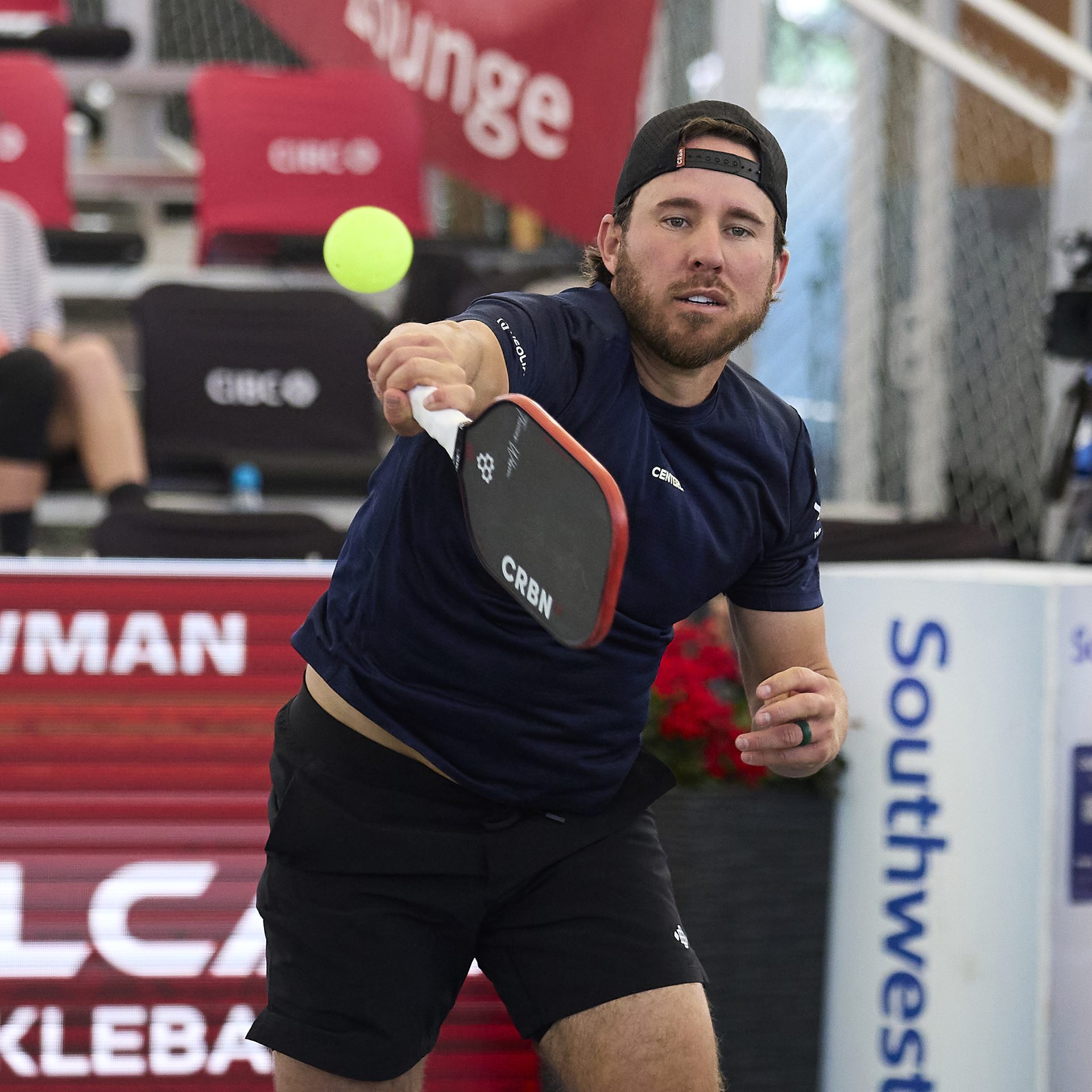 Thomas Wilson hitting a pickleball