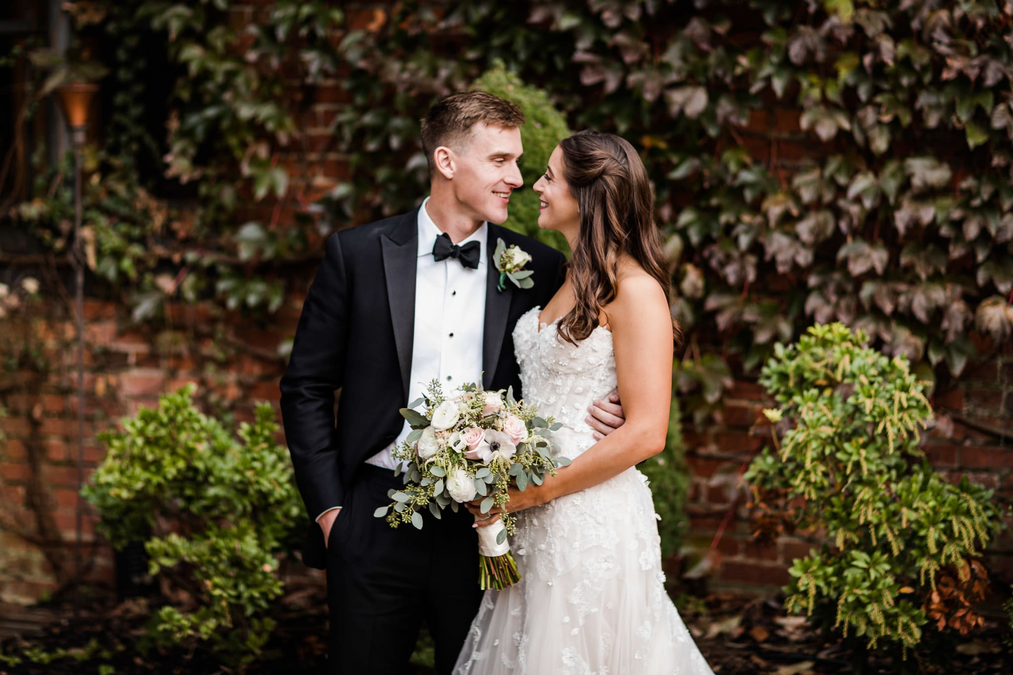 A Wedding Ceremony Trend We're Loving: Grounded Floral Arches