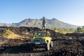 Jeep Riding Through Black Lava Fields
