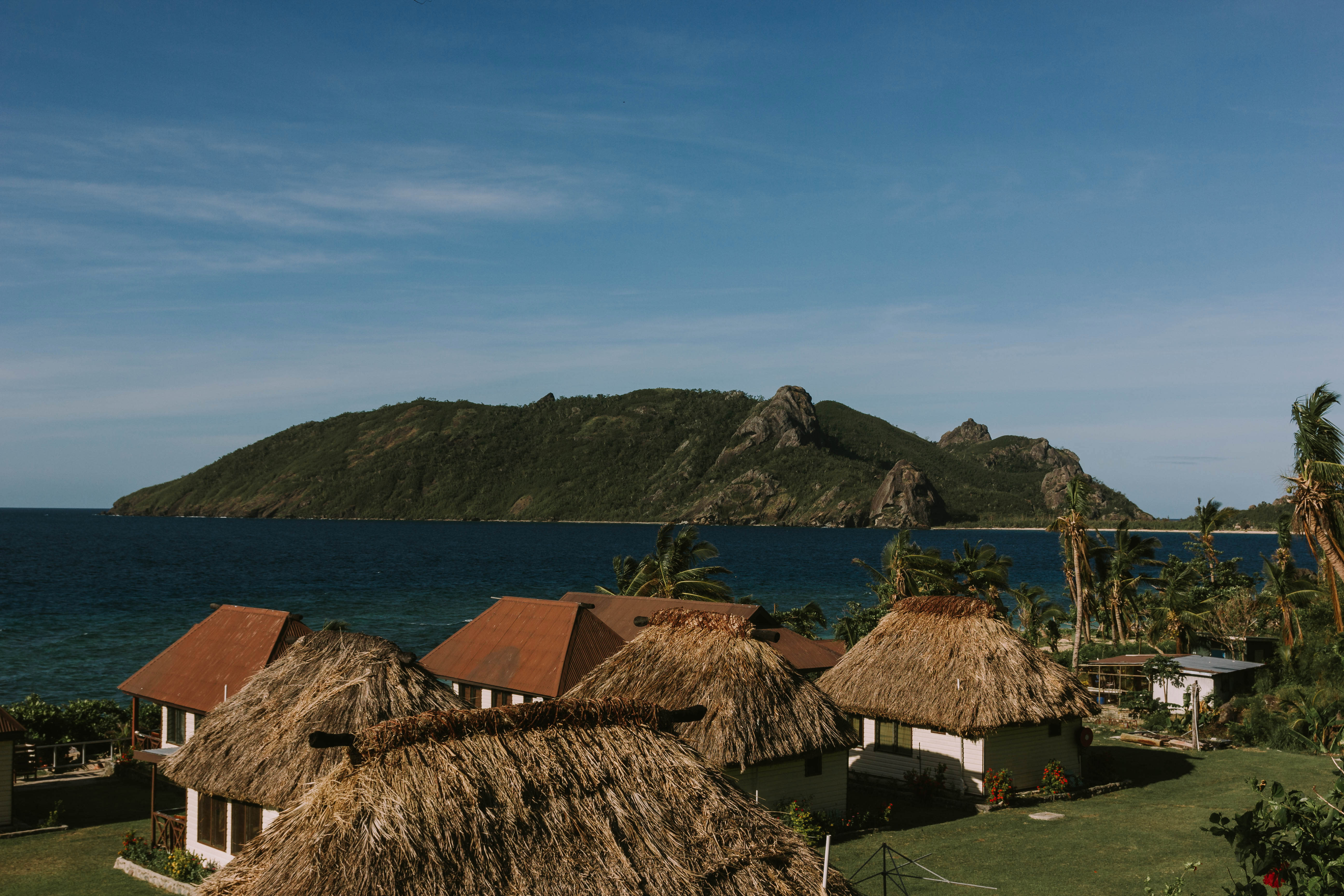Huts over looking a beach and another island