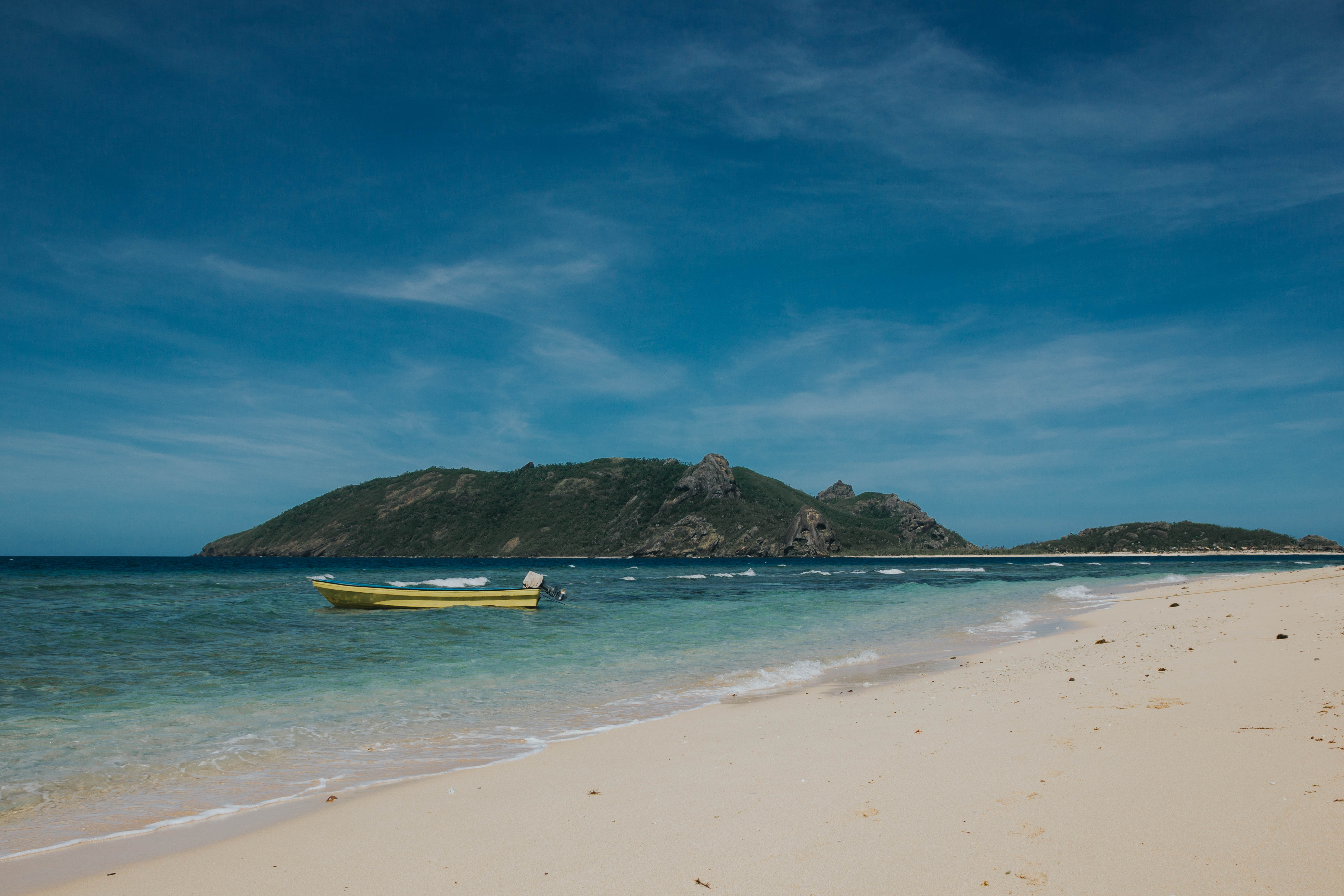 Beach view with boats in the water