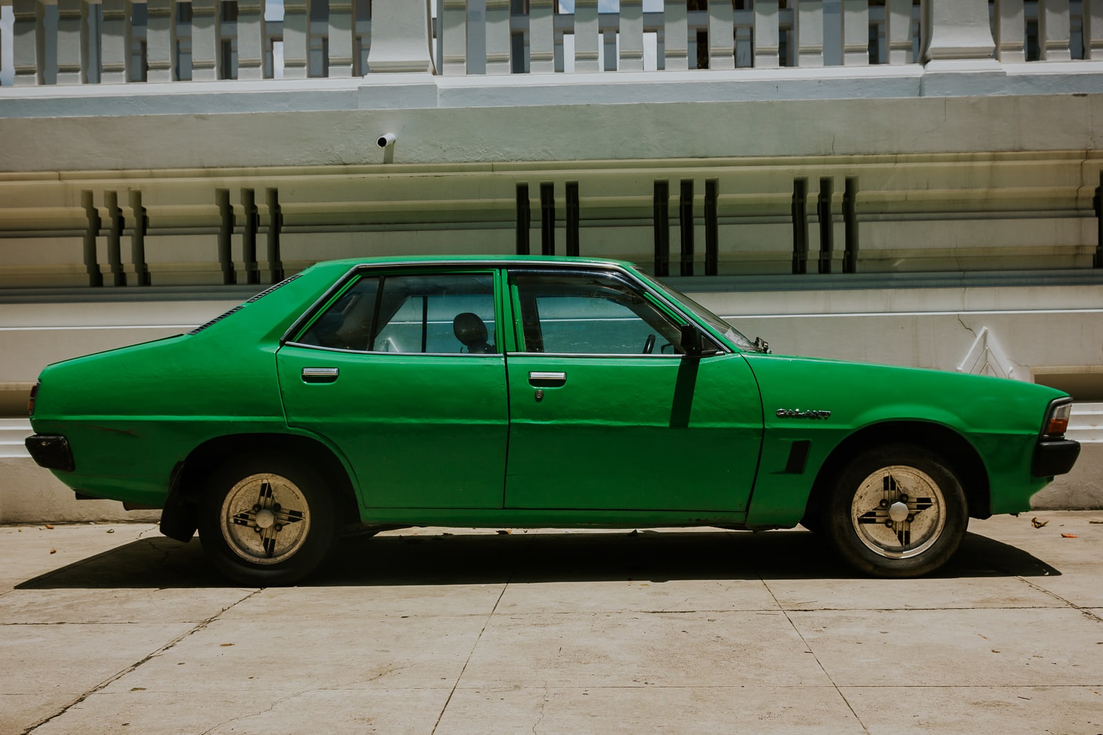 Green vintage car side on