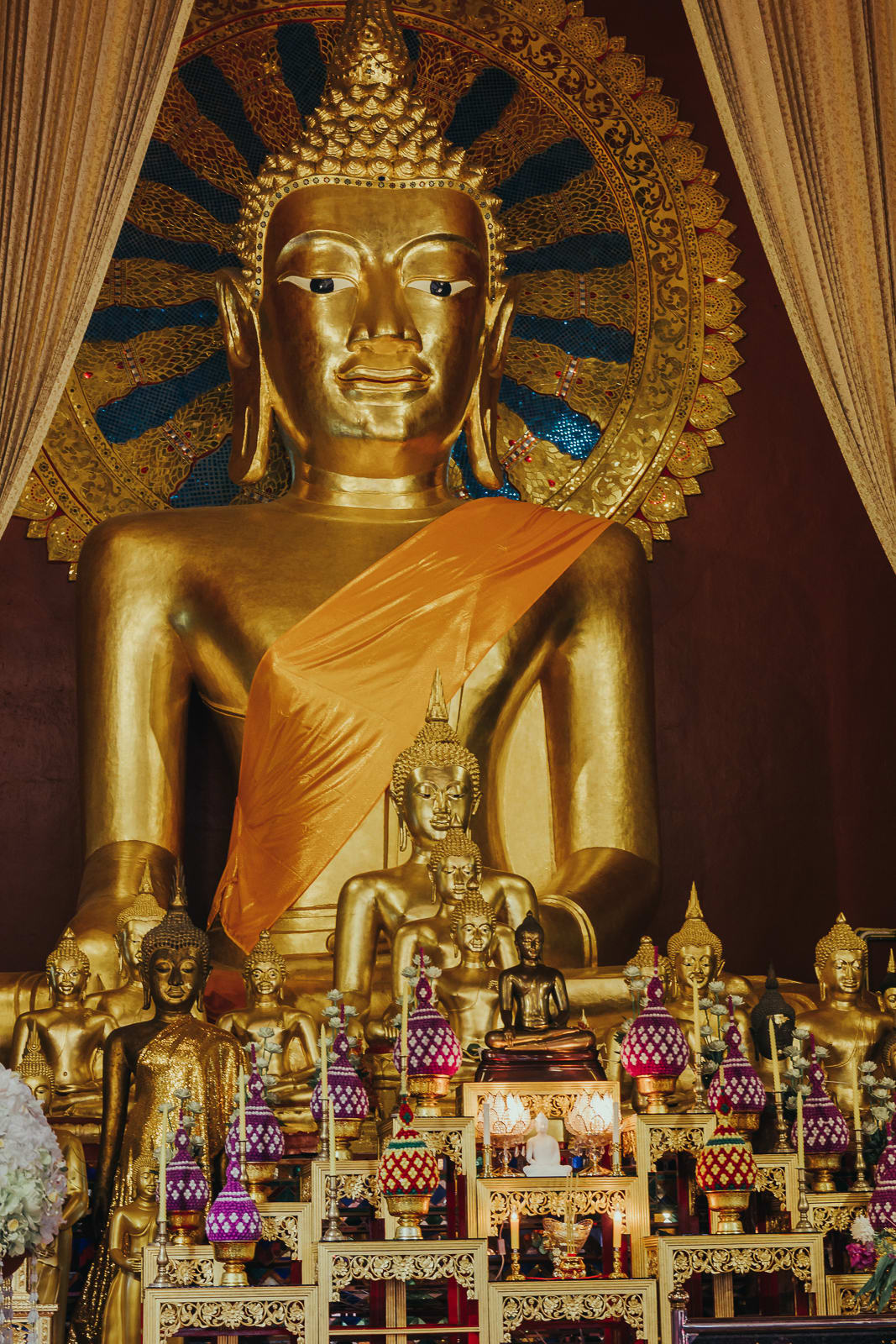 Golden Buddha with smaller Buddhas