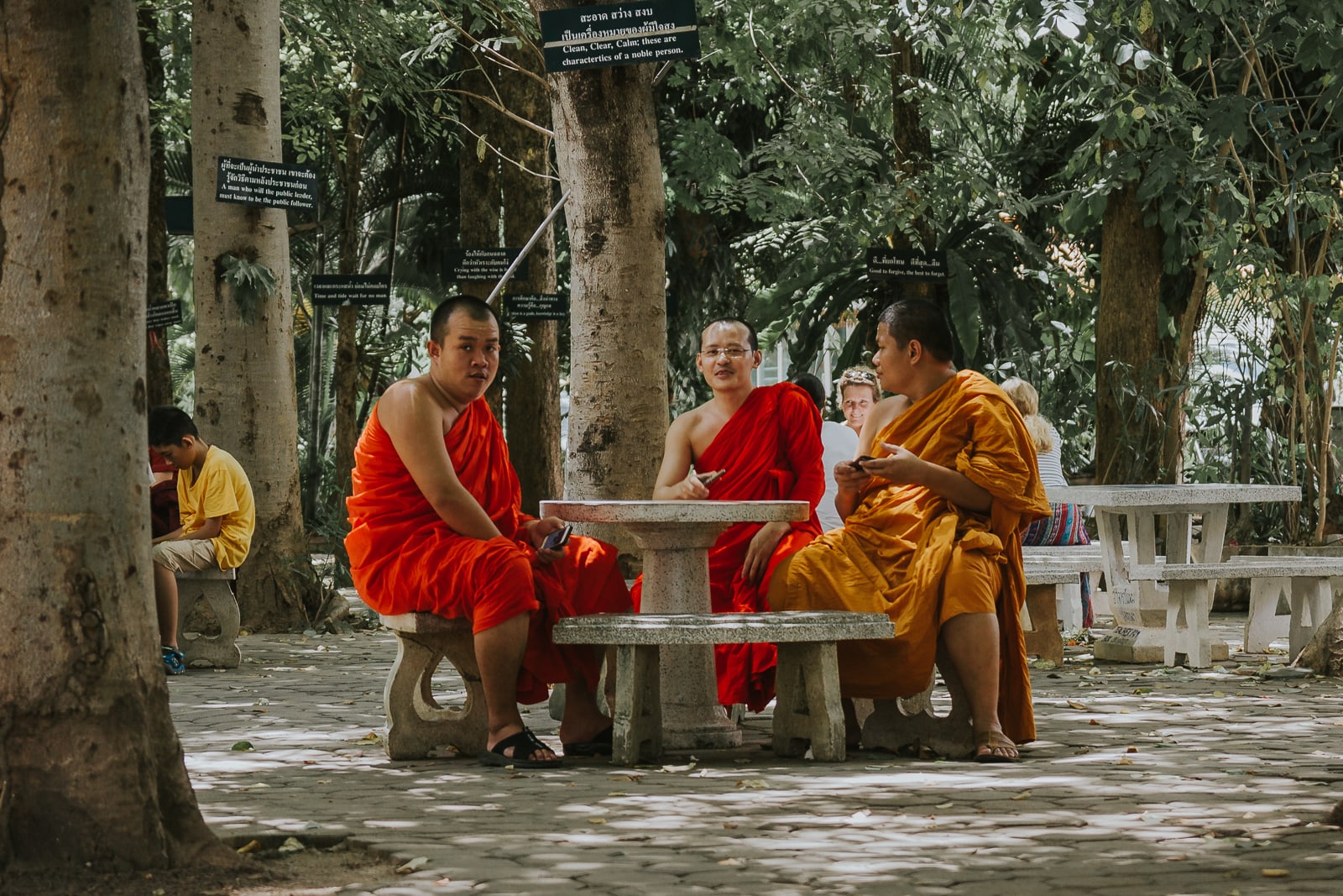 Monks sitting at table