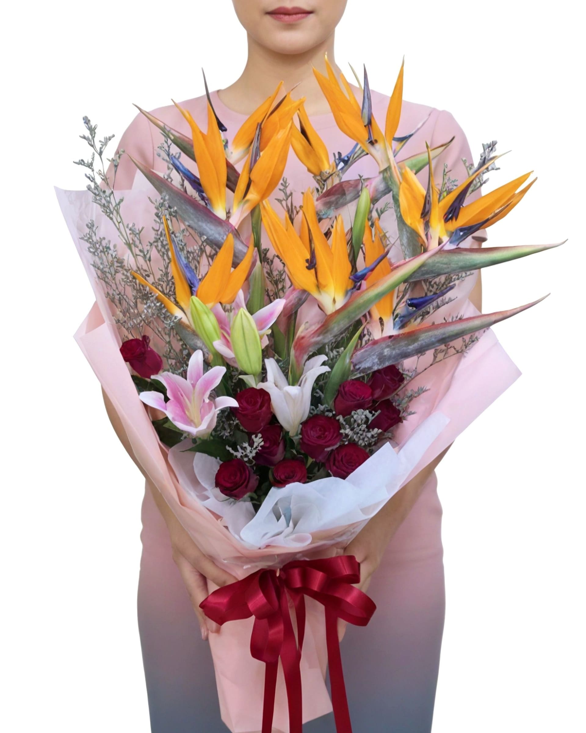 Model with Paradise Grand Bouquet Bird of Paradise, Pink Lily & Red Rose