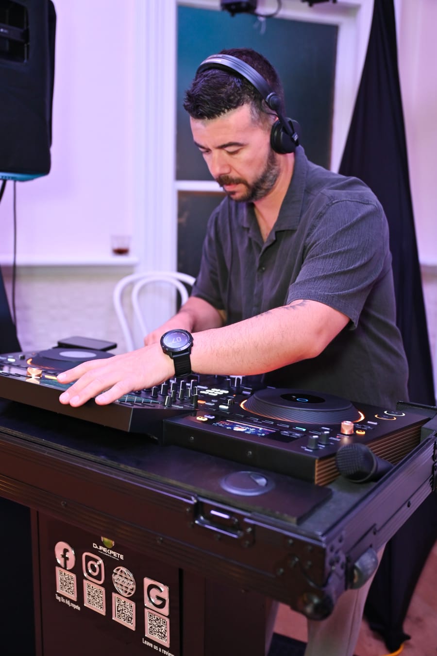 DJ Repete mixing live on professional decks at a Melbourne event