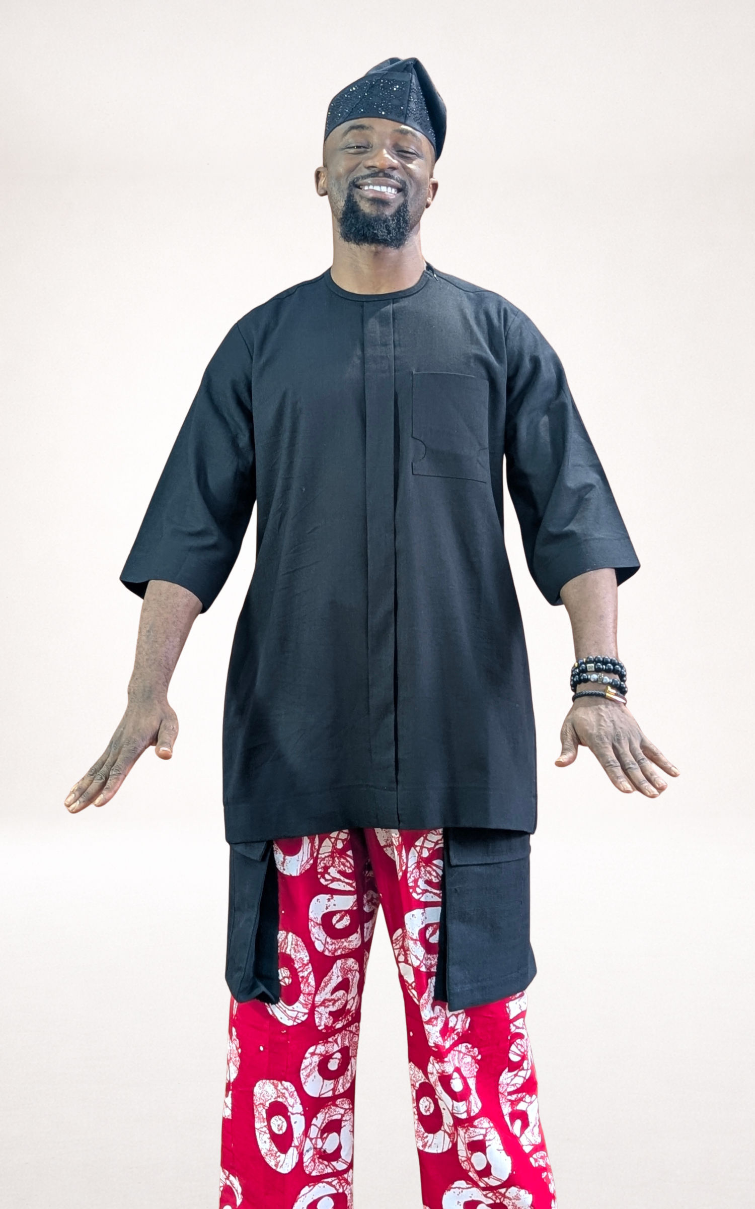 Red Adire Trousers, Black Native Shirt and Black Cap - page 1