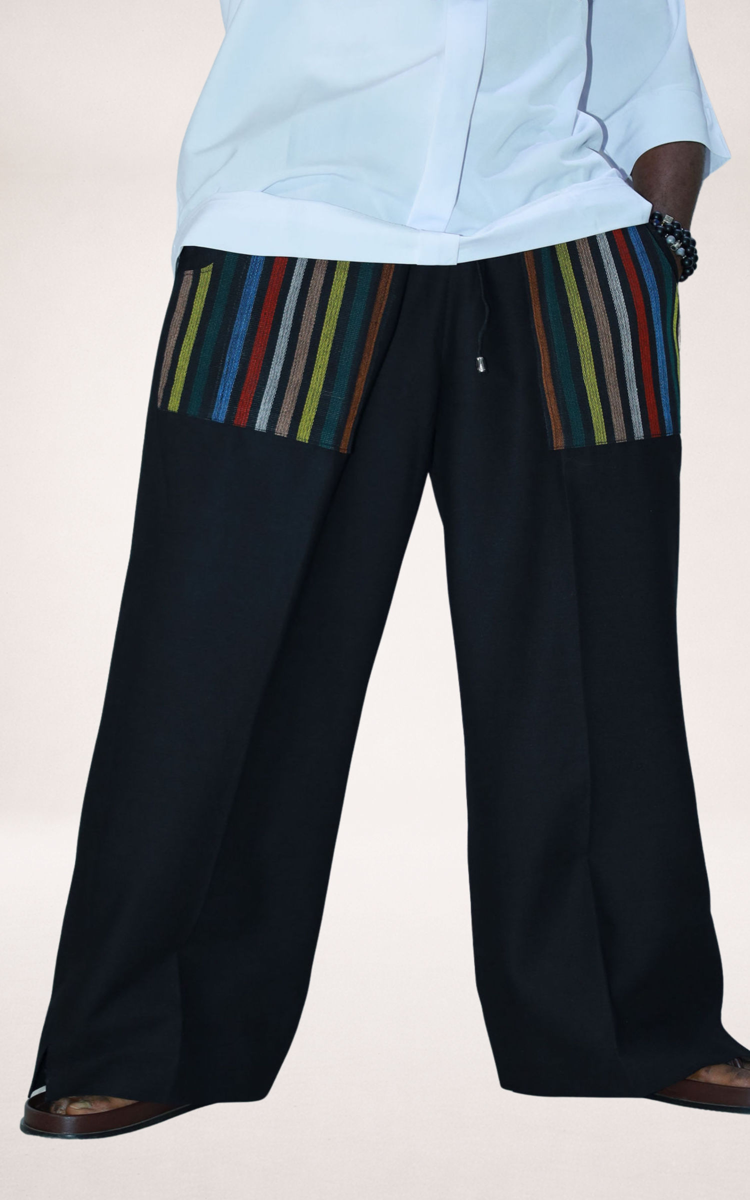 Black Adire Trousers With Striped Colored Pockets - page 1