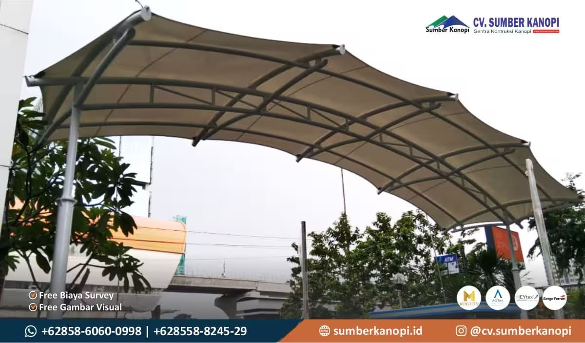 kanopi membrane area luas untuk gerbang masuk gedung komersial dengan desain elegan
