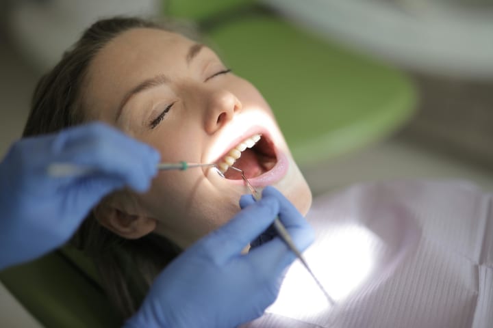 Dental surgeon performing implant procedure