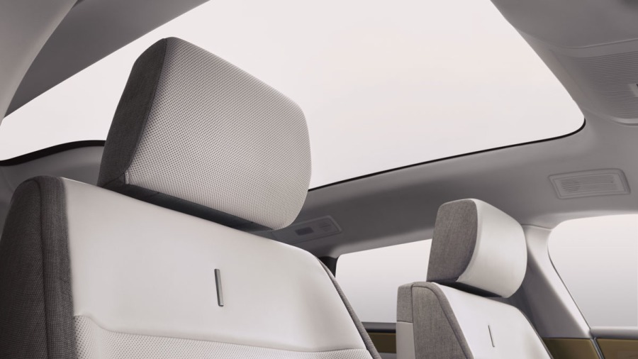 Jaguar Type 01 interior cabin with 24-inch OLED driver display, central spine and panoramic glass roof