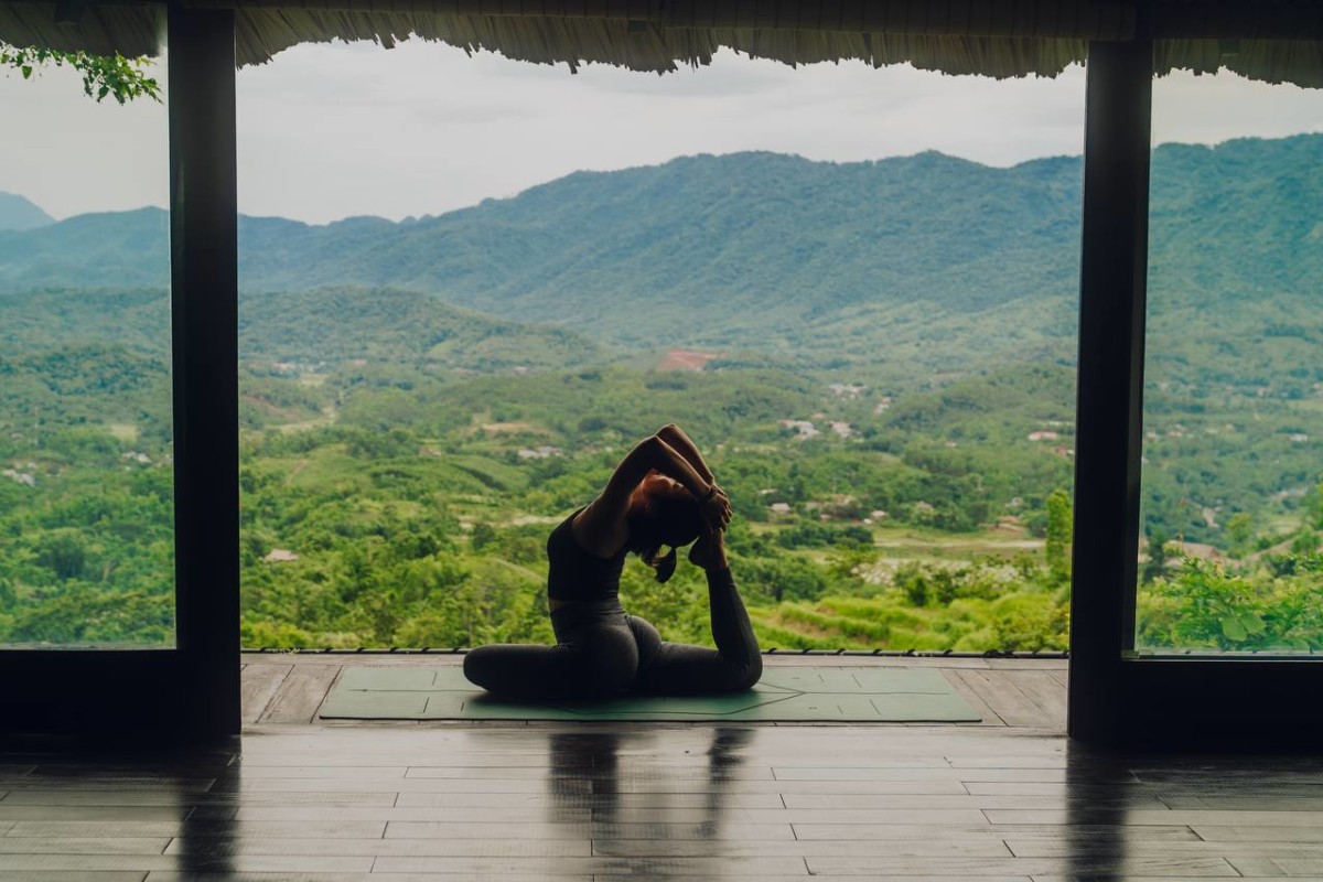 Open-air yoga pavilion overlooking the valley at Avana Retreat