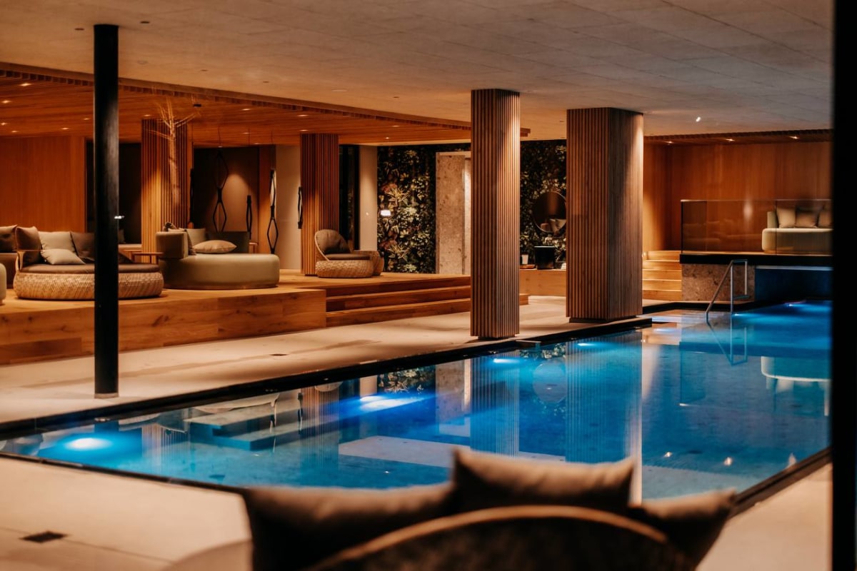 waldSPA interior with illuminated pool and timber cladding