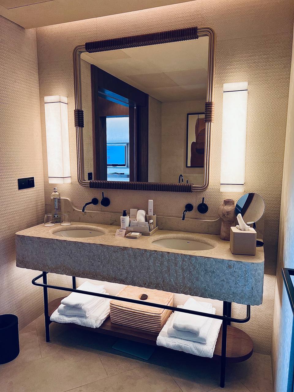 Selene Suite bathroom with stone vanity and integrated lighting at Amoh Rhodes