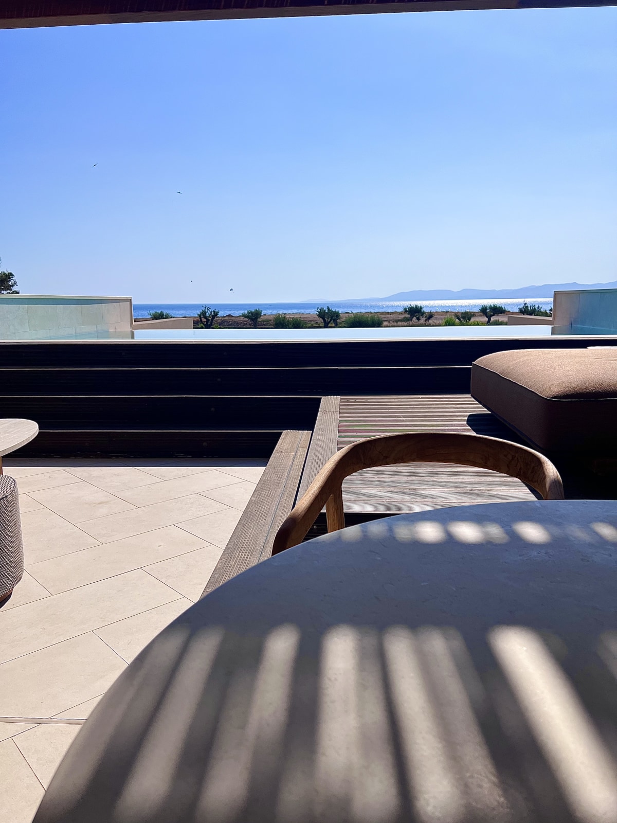 Terrace with infinity pool overlooking the Aegean Sea at Amoh Rhodes