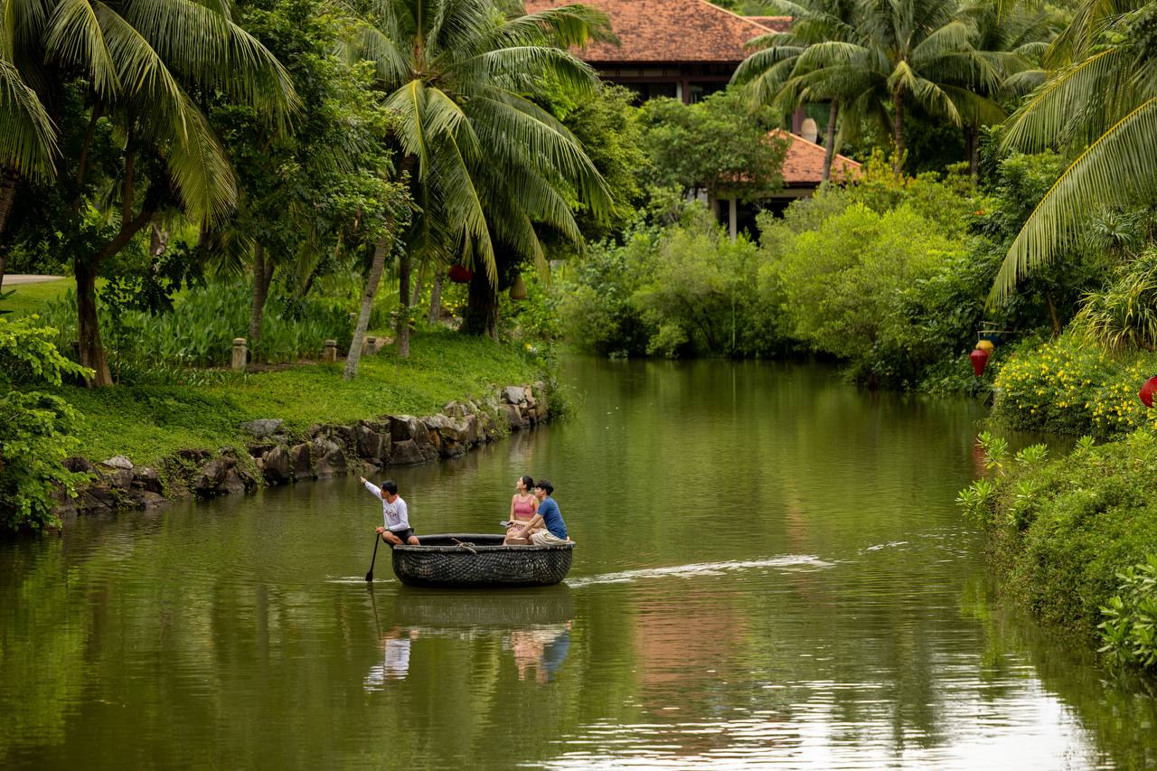Traditional basket boat ride through the resort canal