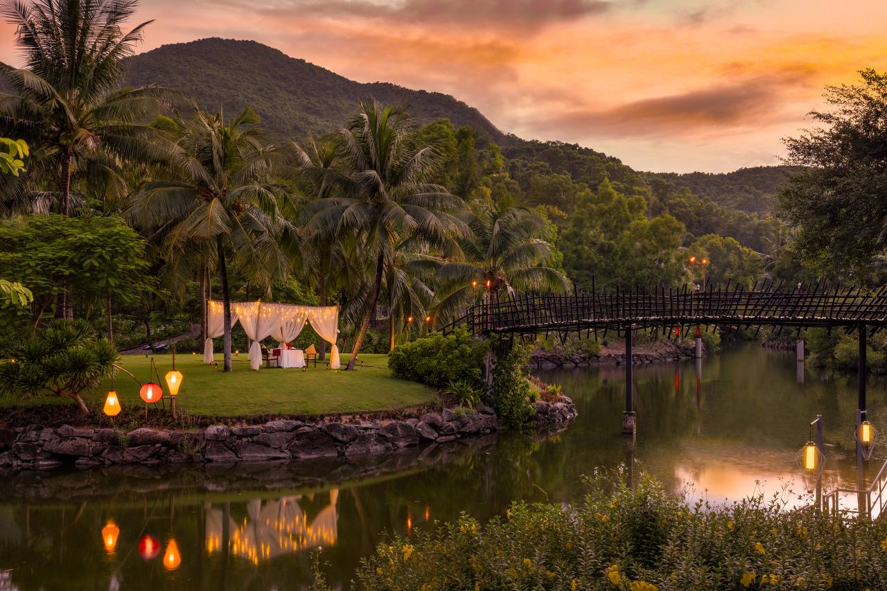 Private candlelit dinner at sunset beside the lagoon