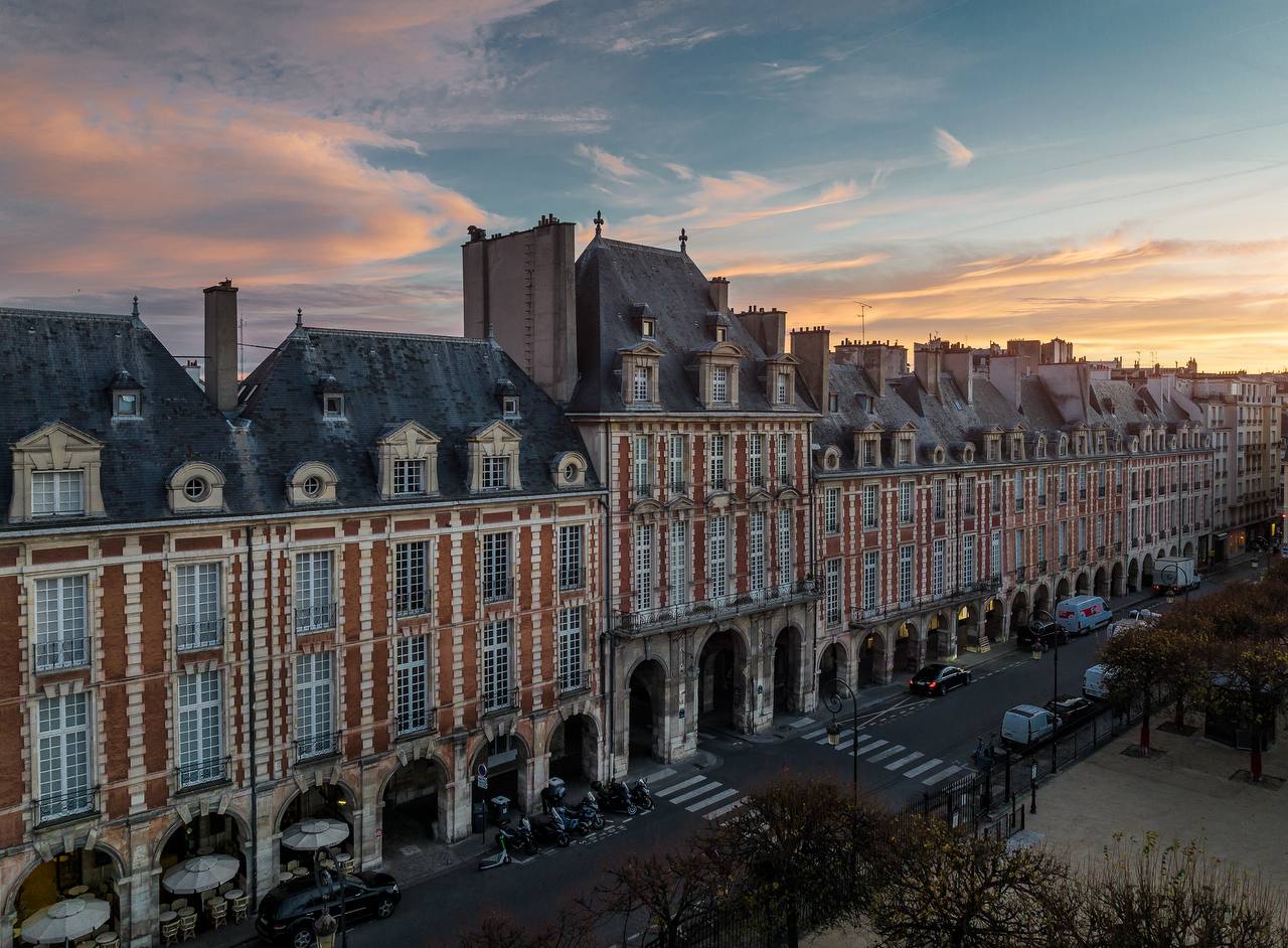 Place des Vosges at golden hour, home of Pavillon de la Reine