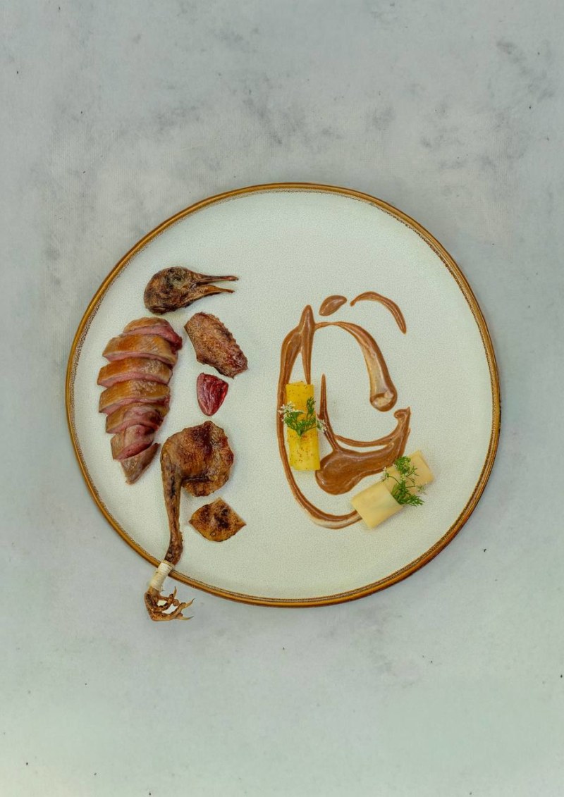 Nephele signature from Mekong Delta terroir: pigeon, cocoa, mango