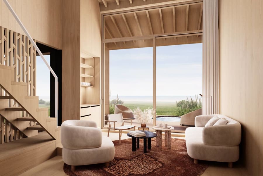 Coastal living room with timber cladding and panoramic sea view