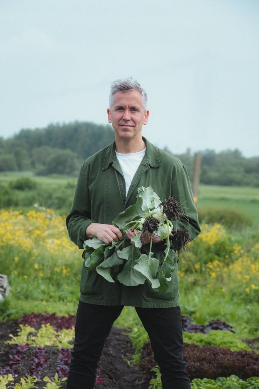 Chef Peeter Pihel holding freshly harvested kohlrabi