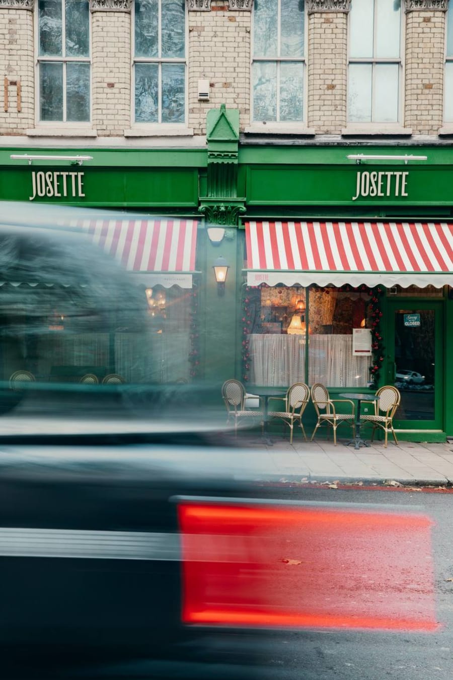 Josette storefront with red-and-white striped awnings in Clerkenwell