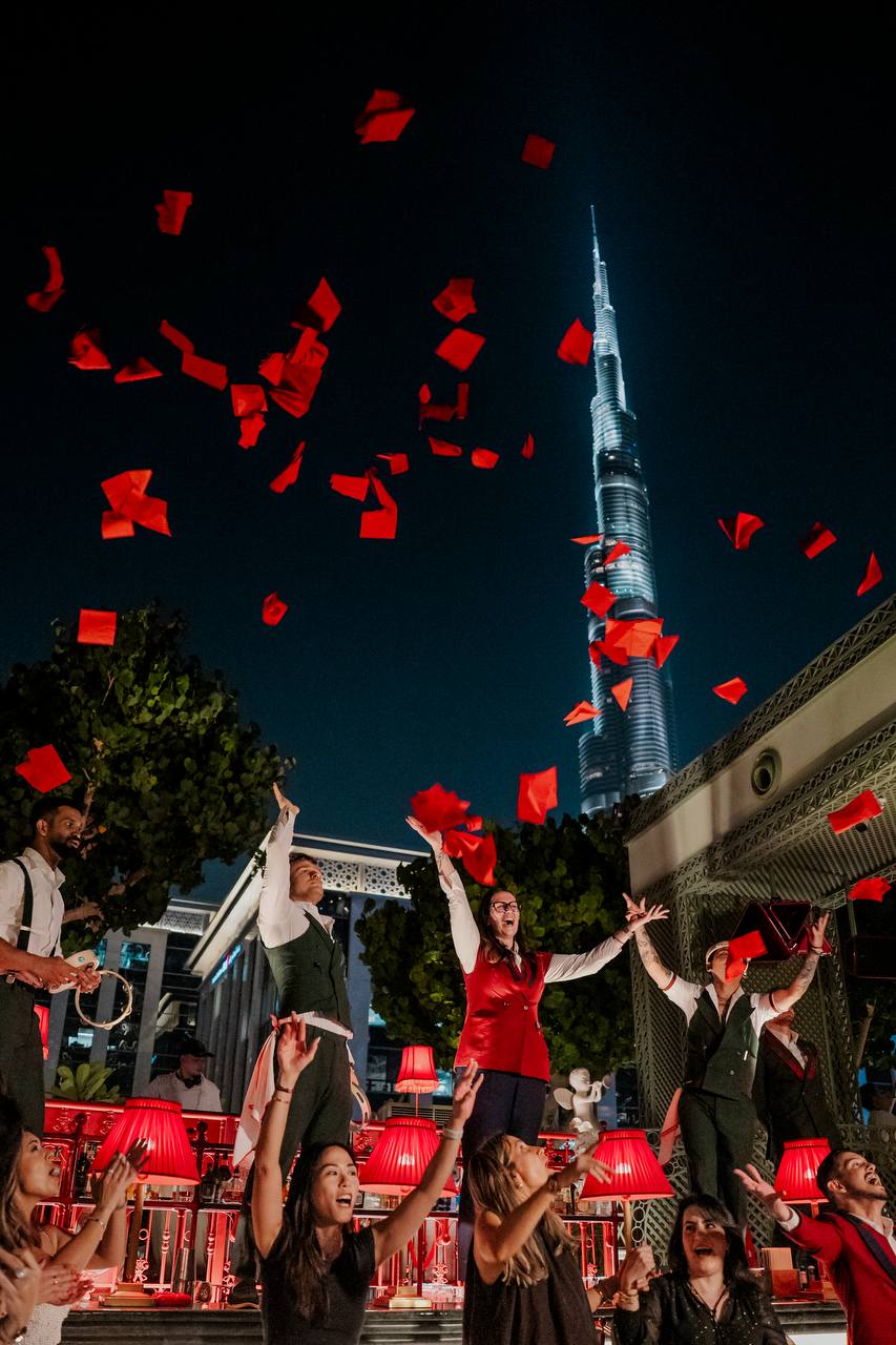 Confetti celebration with Burj Khalifa illuminated behind at Felicità Dubai