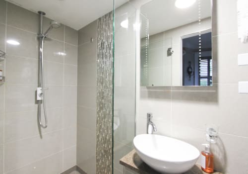 Versailles Gold King bathroom with walk-in shower