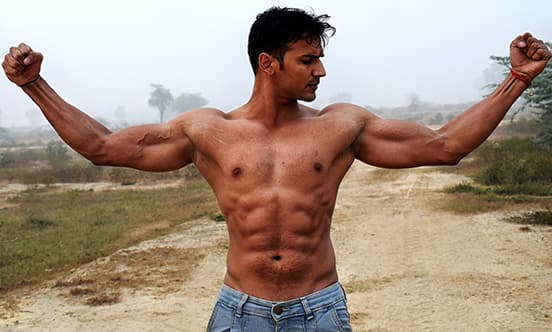a man shows his abs