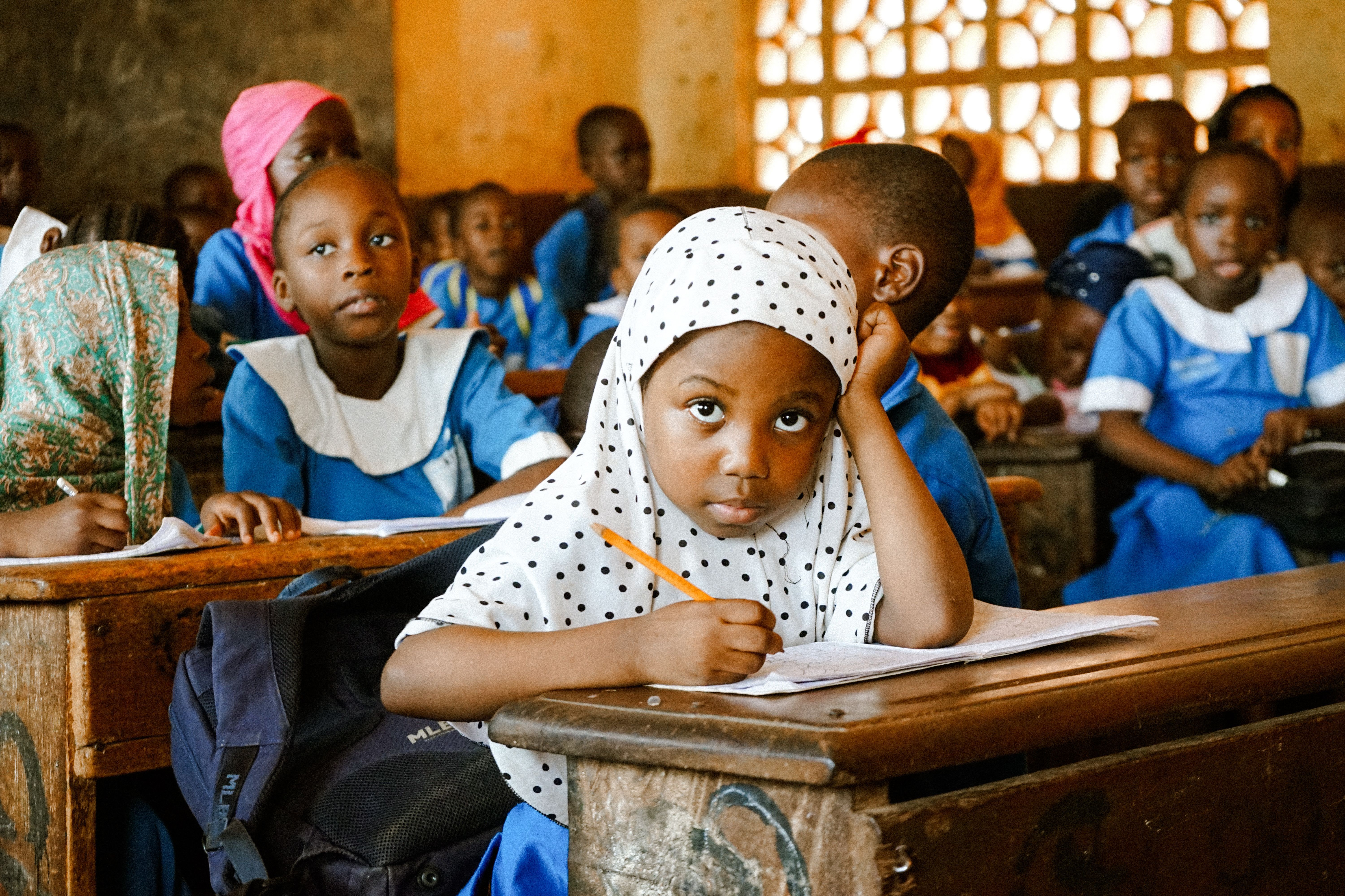 African schoolgirl learning in a classroom