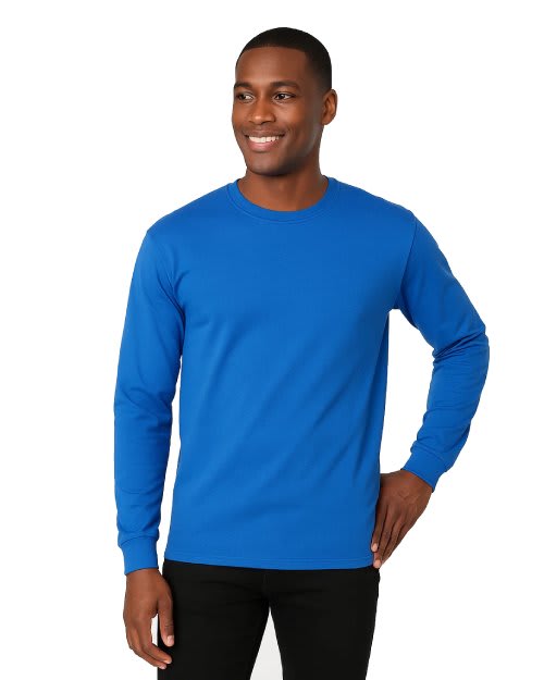 Women's royal blue 100% cotton crew neck long sleeve t-shirt with ribbed cuffs on a model.