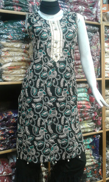 Rania Fashion (Cloth Wholesaler in Lahore) logo
