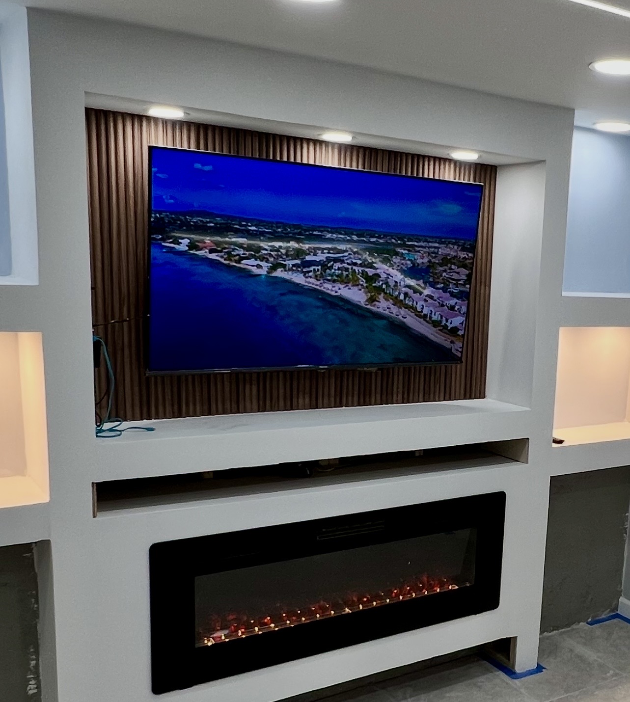 Mounted TV with hidden wires in living room