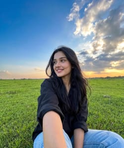 Golden Hour Meadow Selfie — Vast Sky, Windswept Hair & Serene Freedom