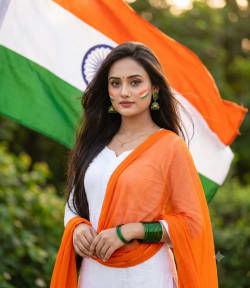 Elegant Indian Woman with National Flag, Outdoor Cinematic Golden Hour Portrait