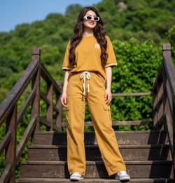 Editorial Streetwear Portrait on Wooden Staircase with Mustard-Gold Outfit