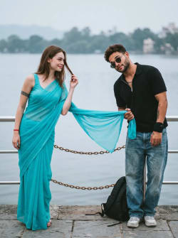 Playful Outdoor Couple Portrait with Woman in Cyan Saree by Lake