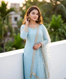 Indian Woman in Sky Blue Salwar Suit on Golden Hour Terrace