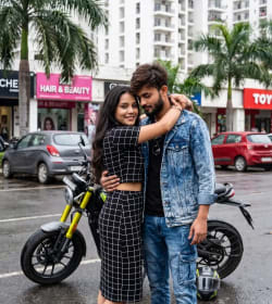 Young Couple Embracing on Wet City Street Beside Black Motorcycle