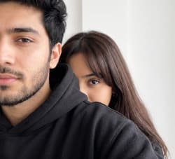 Candid Close Up Smartphone Selfie of Young Couple in Black Hoodies