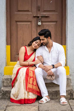 Photorealistic Romantic Indian Couple Portrait in Traditional Attire Outside Doorway