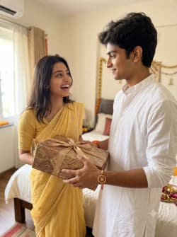 Indian Brother Giving Gift To Sister For Raksha Bandhan Celebration