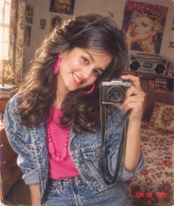 Retro 1980s Indian Woman Taking Mirror Selfie With Vintage Camera