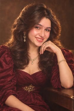 Retro 1980s South Asian Woman Portrait in Burgundy Velvet Dress